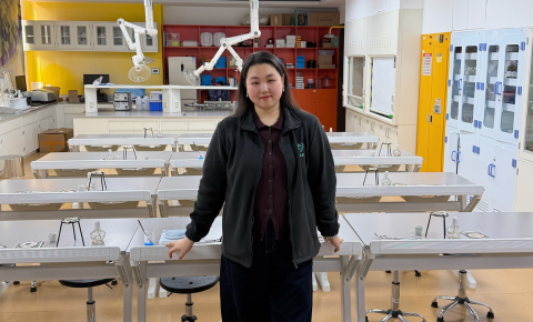 An image of Haorui Li standing in her lab.