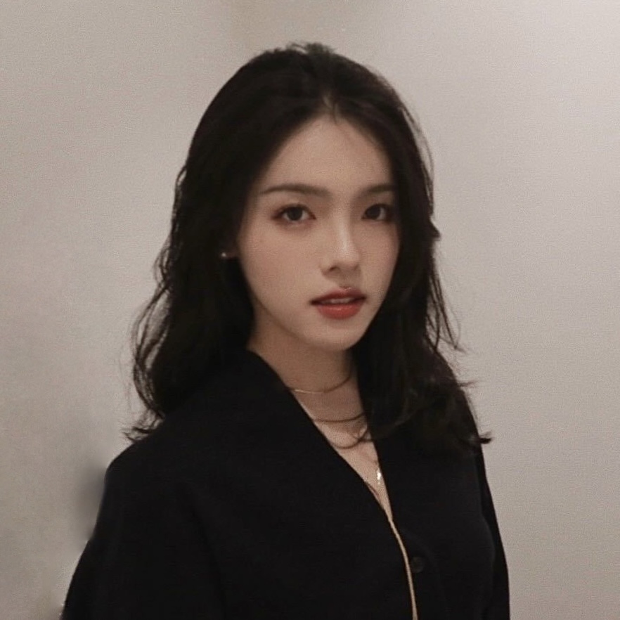 An image of Shirley Liu. She is wearing a black top and a gold necklace.