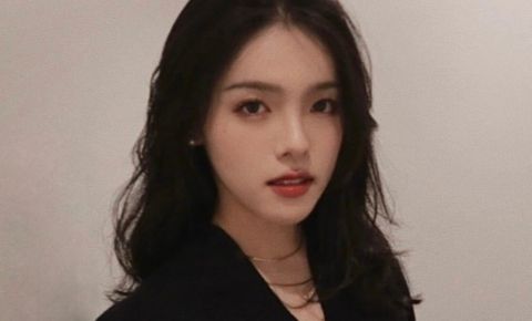 An image of Shirley Liu. She is wearing a black top and a gold necklace.