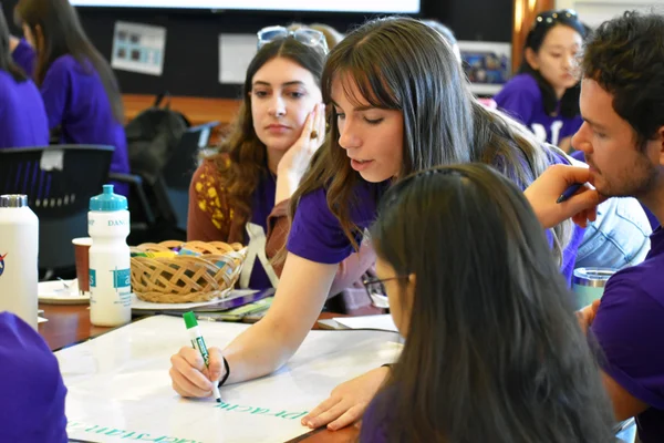 MSEd students collaborate on a group activity at new student orientation.