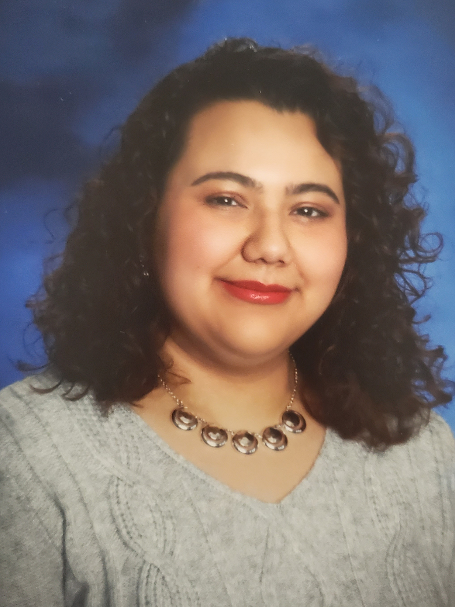 Andre Reyes' headshot.