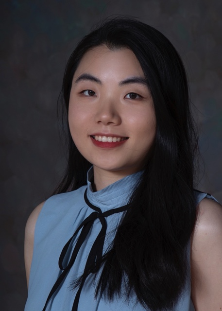 An image of Jiayi. She is smiling for the camera.