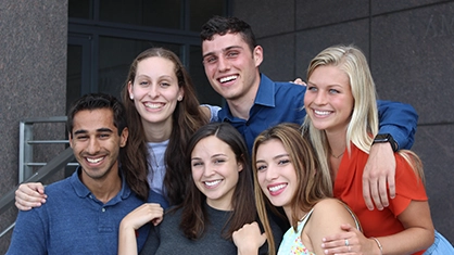 six students smiling