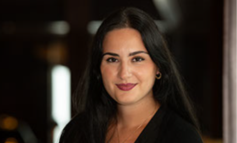 An image of Saranda smiling.