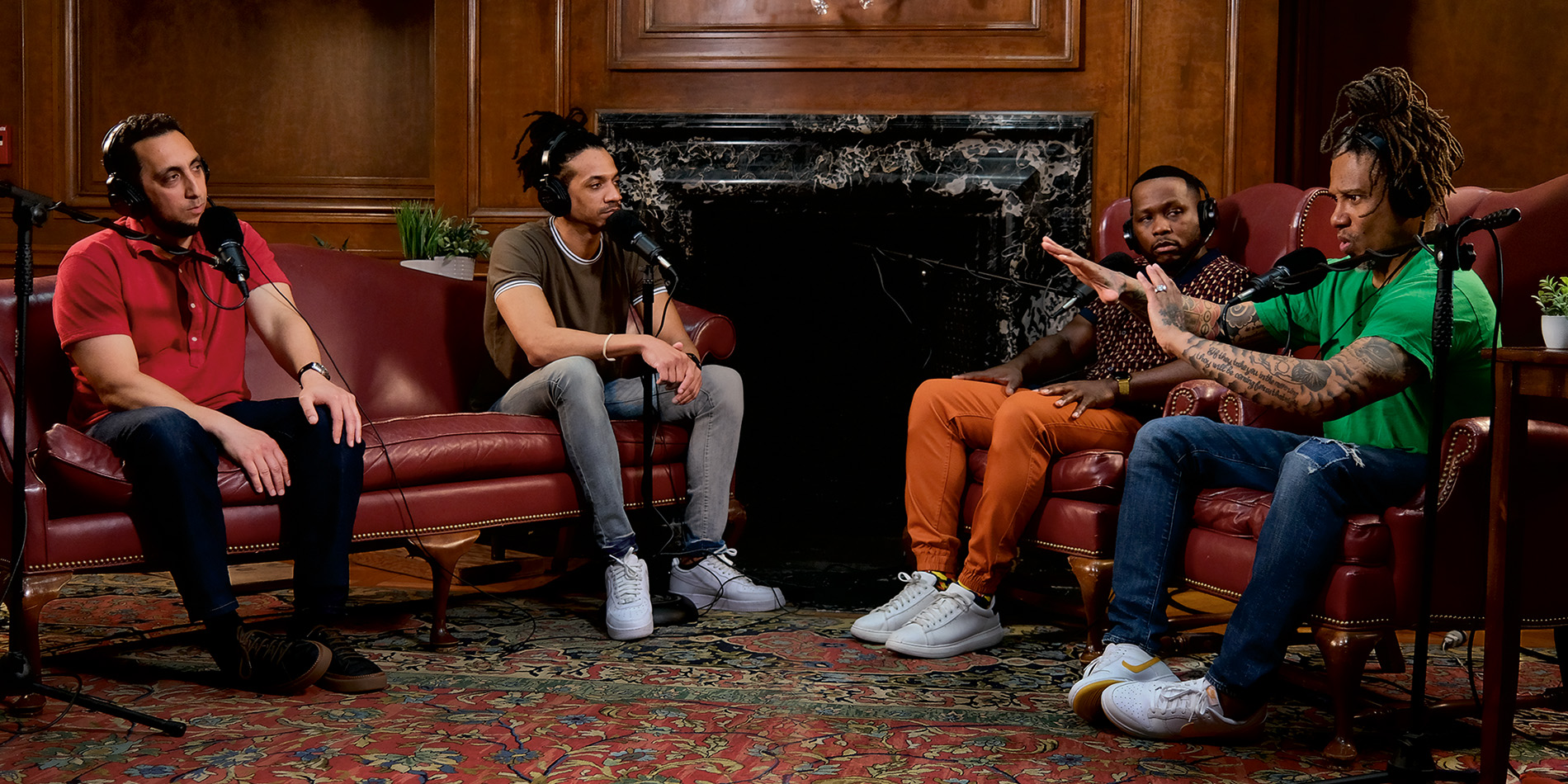 (From left) Vakil and Knight record a recent podcast with comedian  Calvin Evans and University of Illinois Chicago professor David Stovall.