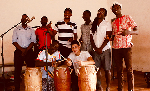 Cesar Almeida, (first row, right) will produce a podcast in Ghana