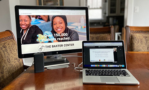 screens displaying the Baxter Center website